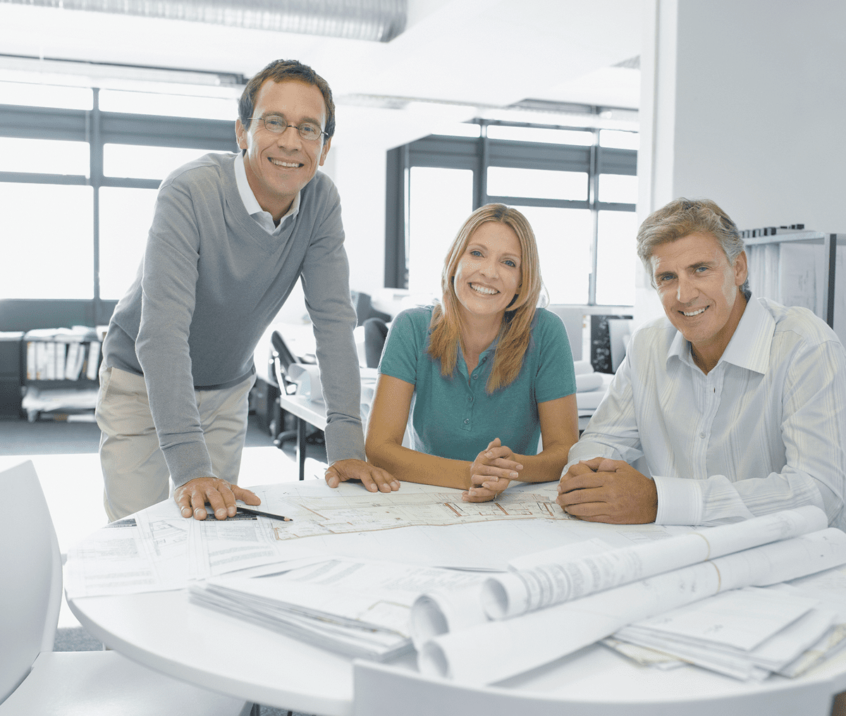 Colleagues discussing architectural designs